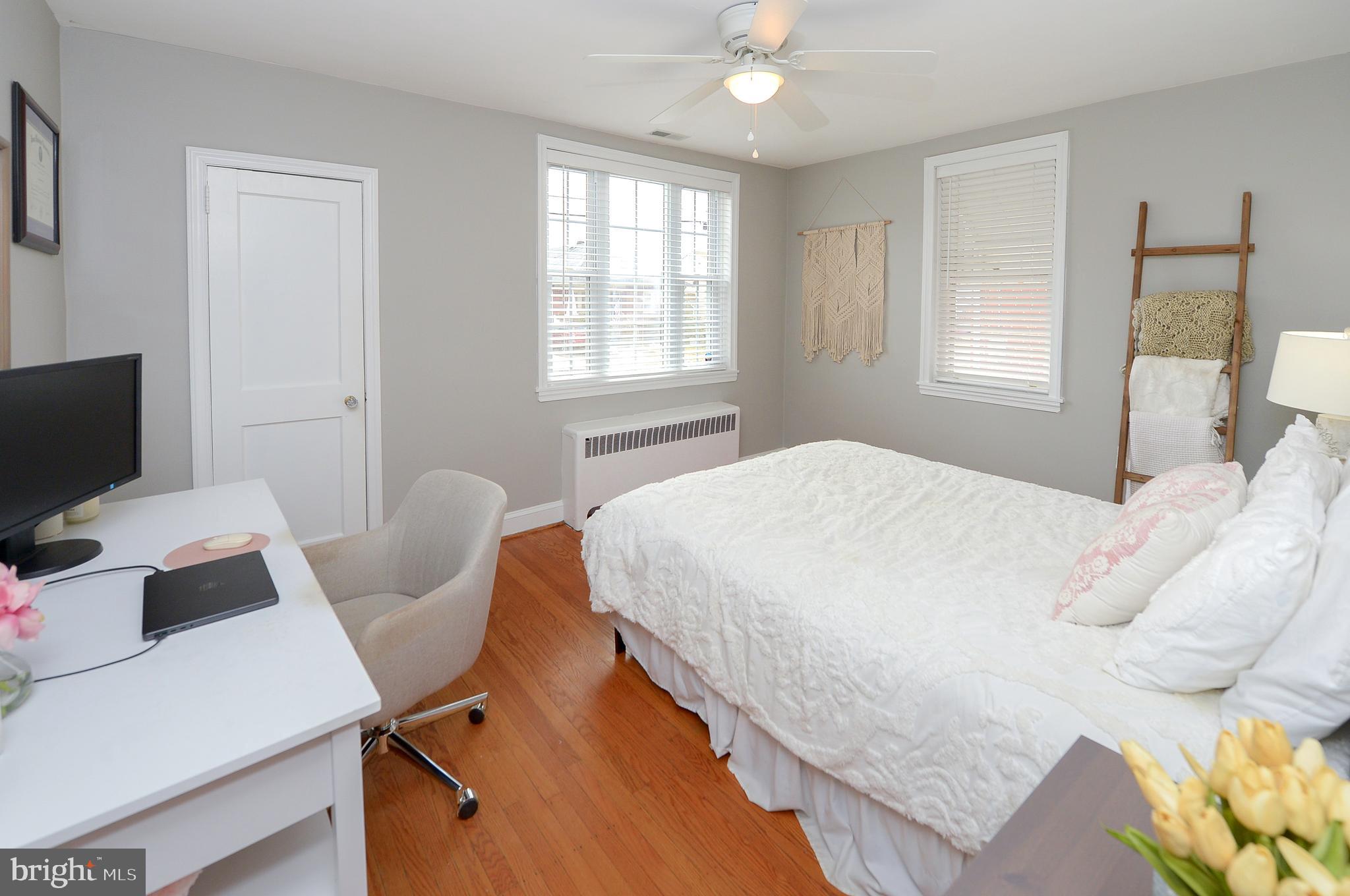 1929 Wayne Avenue Haddon Heights, NJ 08035 - Photo 12 of 36 a bedroom with a bed and a desk