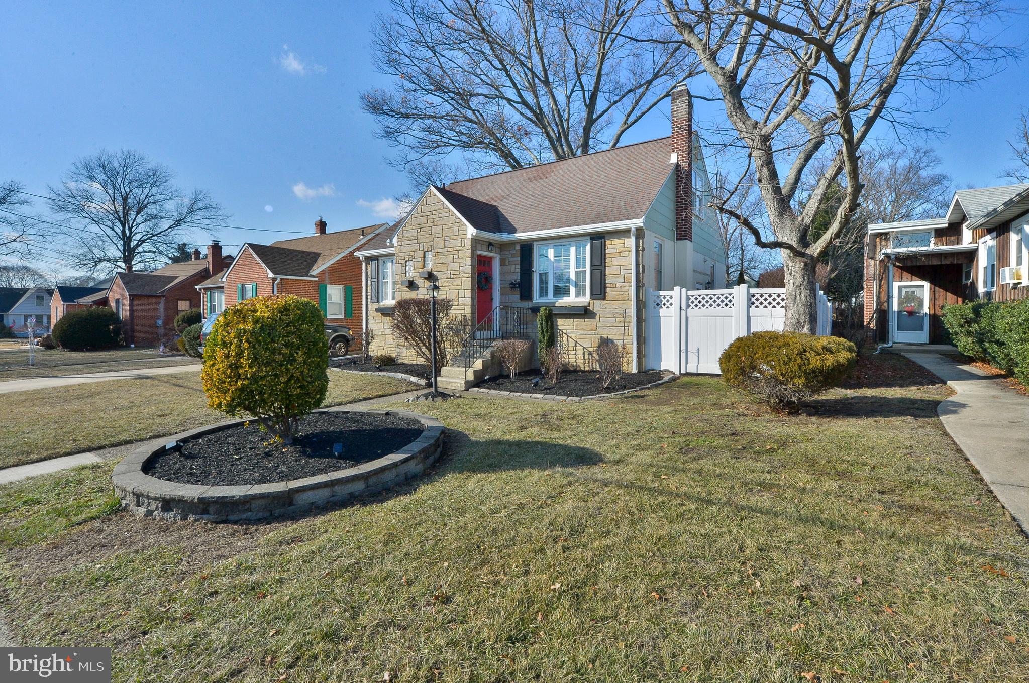 1929 Wayne Avenue Haddon Heights, NJ 08035 - Photo 2 of 36 a front view of a house with a yard and garage