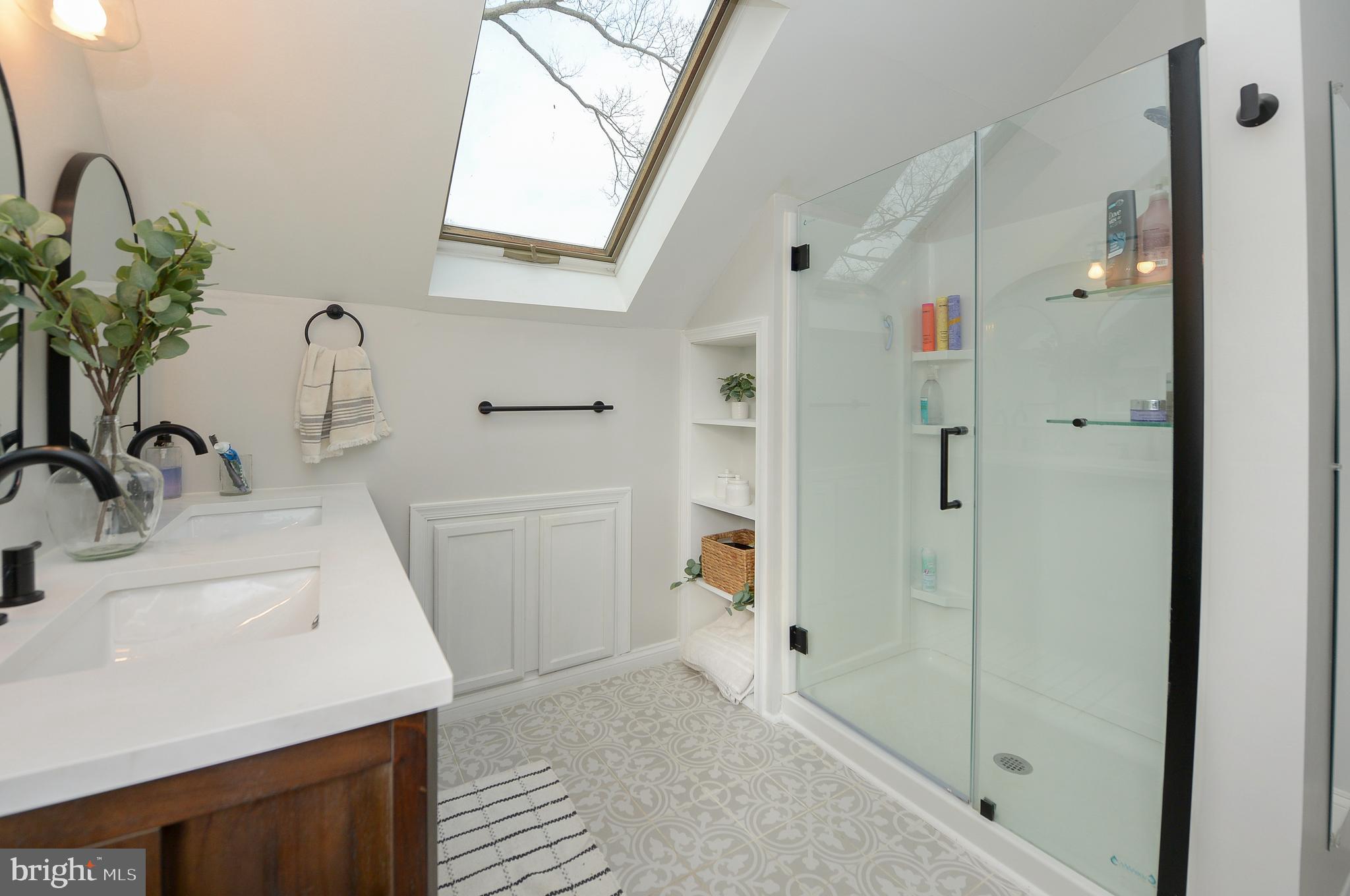 1929 Wayne Avenue Haddon Heights, NJ 08035 - Photo 21 of 36 a bathroom with a sink and a mirror