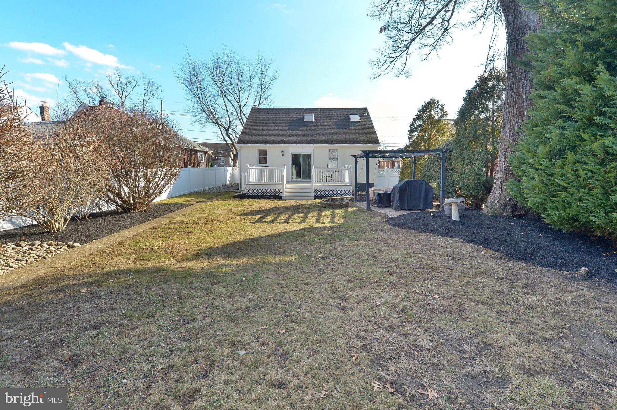 1929 Wayne Avenue Haddon Heights, NJ 08035 - Photo 27 of 36 a view of a house with a yard covered in snow