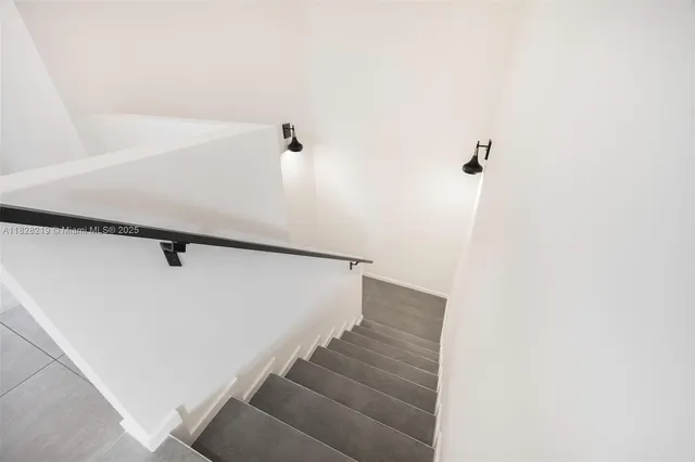 a view of a hallway with an entryway