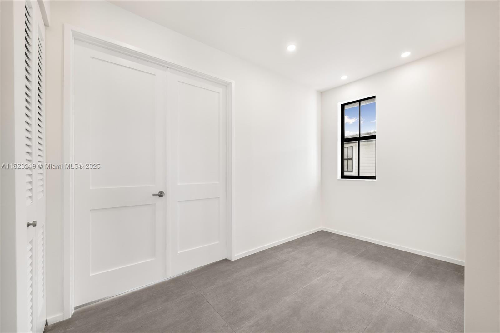 7510 Southwest 100th Street, Unit 12 Pinecrest, FL 33156 - Photo 18 of 36 a view of an empty room