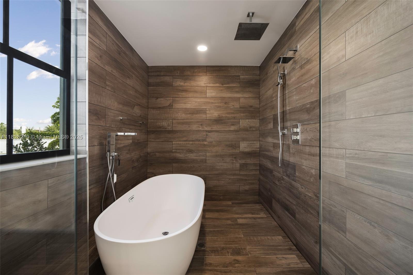 7510 Southwest 100th Street, Unit 12 Pinecrest, FL 33156 - Photo 28 of 36 a bathroom with a toilet and a shower