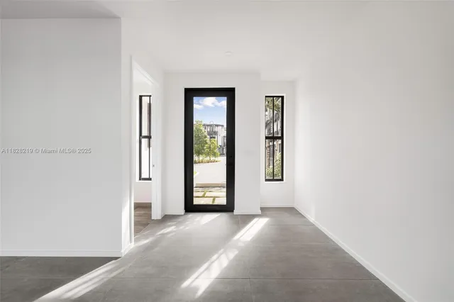 a view of a room that has a window in it