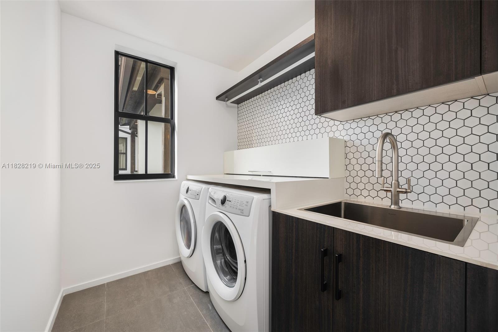 7510 Southwest 100th Street, Unit 12 Pinecrest, FL 33156 - Photo 36 of 36 a utility room with dryer and washer