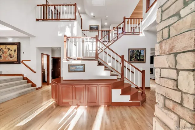 a kitchen with stainless steel appliances granite countertop a refrigerator and stove