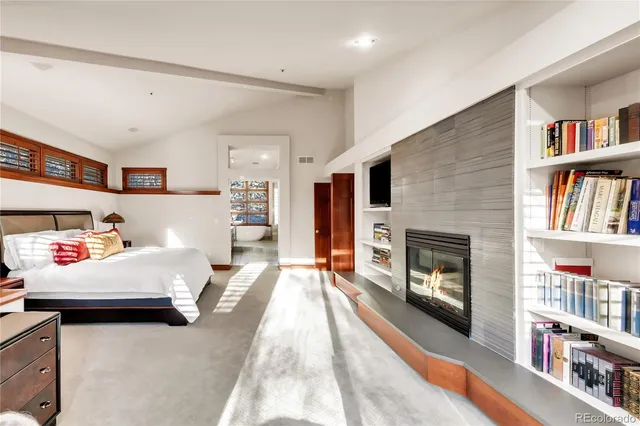 a bathroom with a bathtub and shower