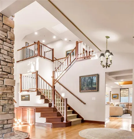 a view of a livingroom with furniture window and wooden floor