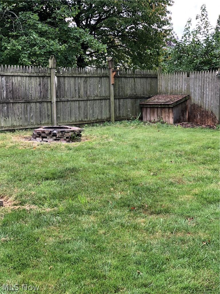 6830 Navarre Road Southwest Massillon, OH 44646 - Photo 23 of 23 Fenced in rear yard with fire pit
