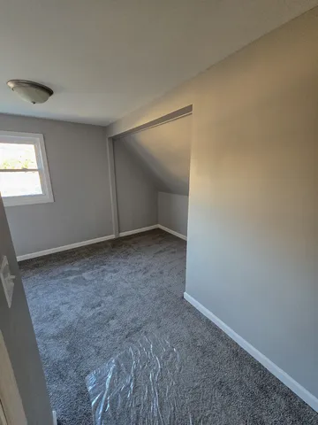 an empty room with a natural light