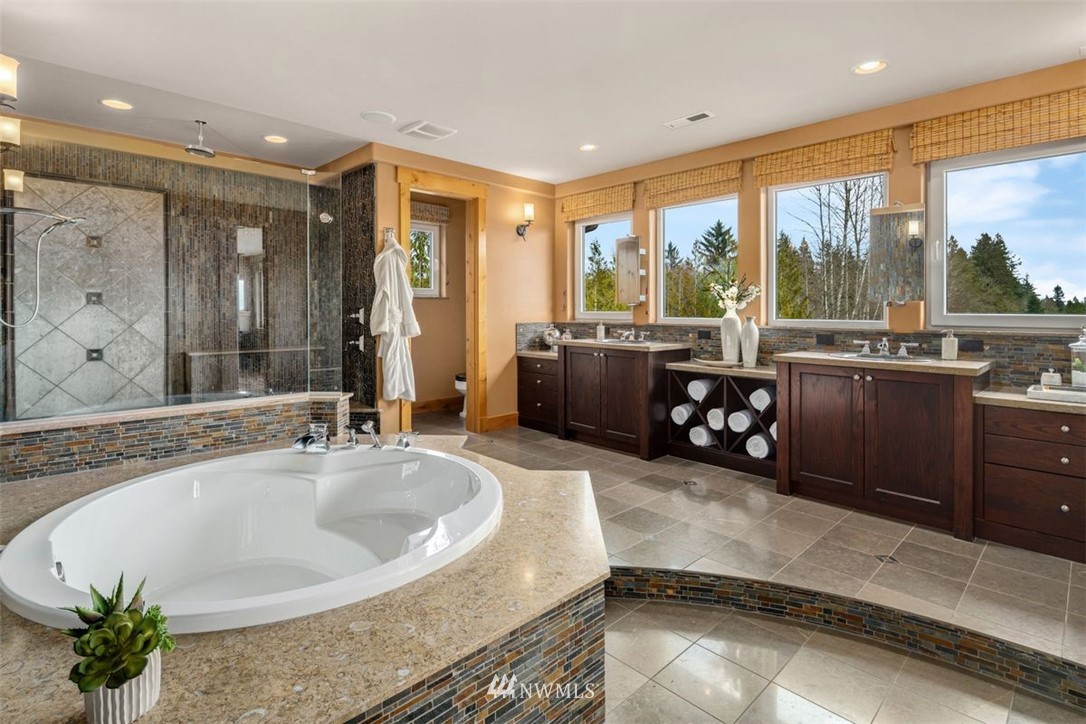12613 Ingraham Road Snohomish, WA 98290 - Photo 22 of 40 a spacious bathroom with a tub and sink
