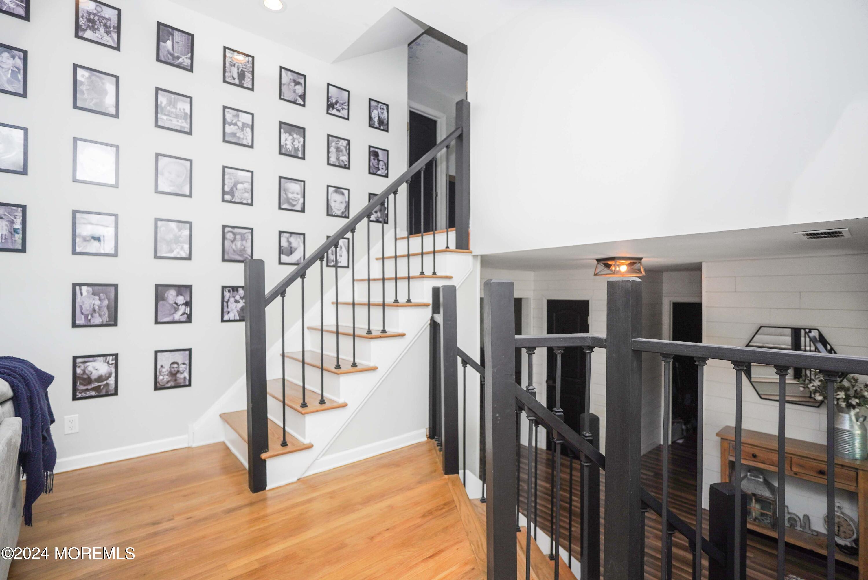 32 Crest Road Middletown, NJ 07748 - Photo 29 of 52 a view of entryway with stairs and front door