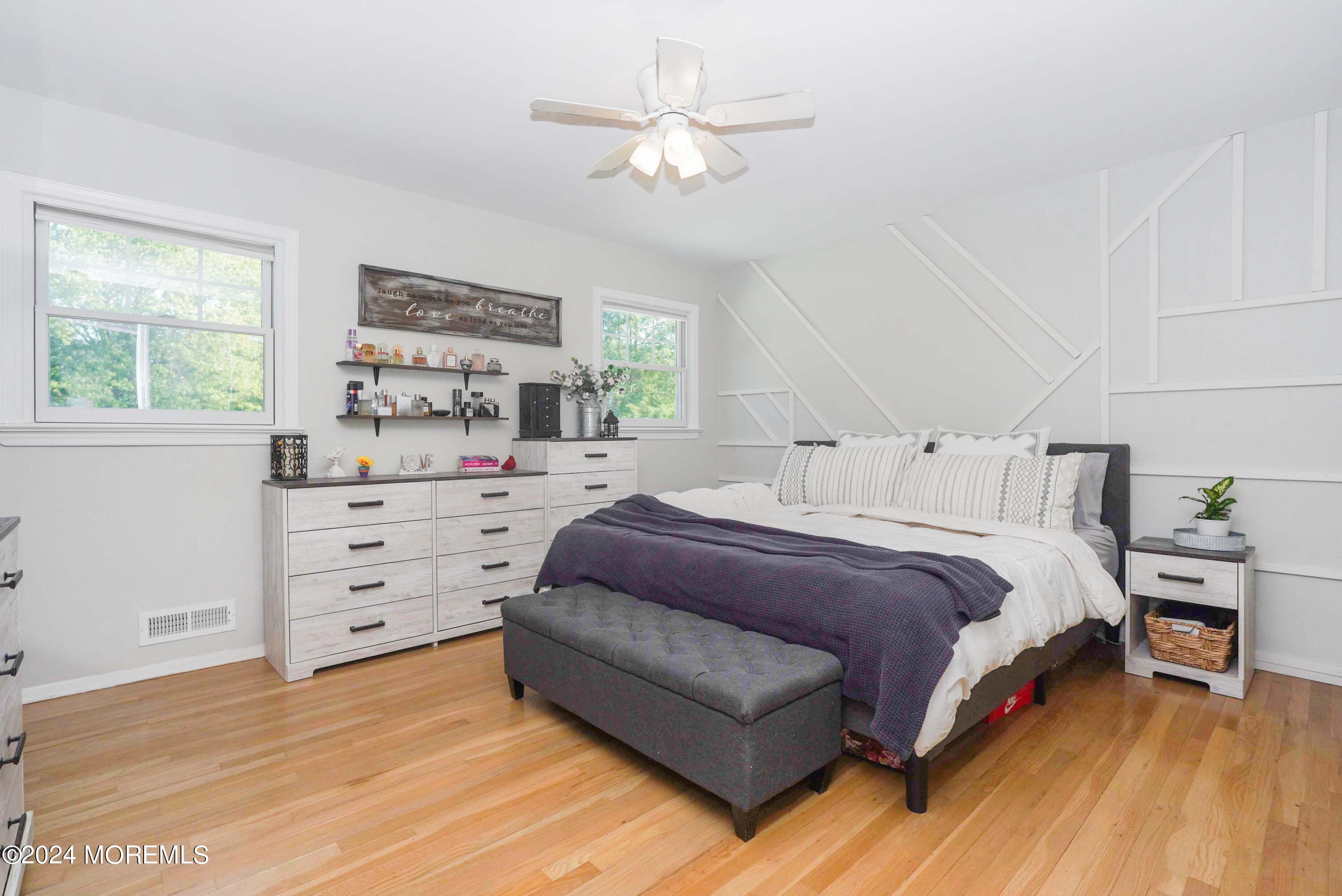 32 Crest Road Middletown, NJ 07748 - Photo 38 of 52 a spacious bedroom with a bed and a window