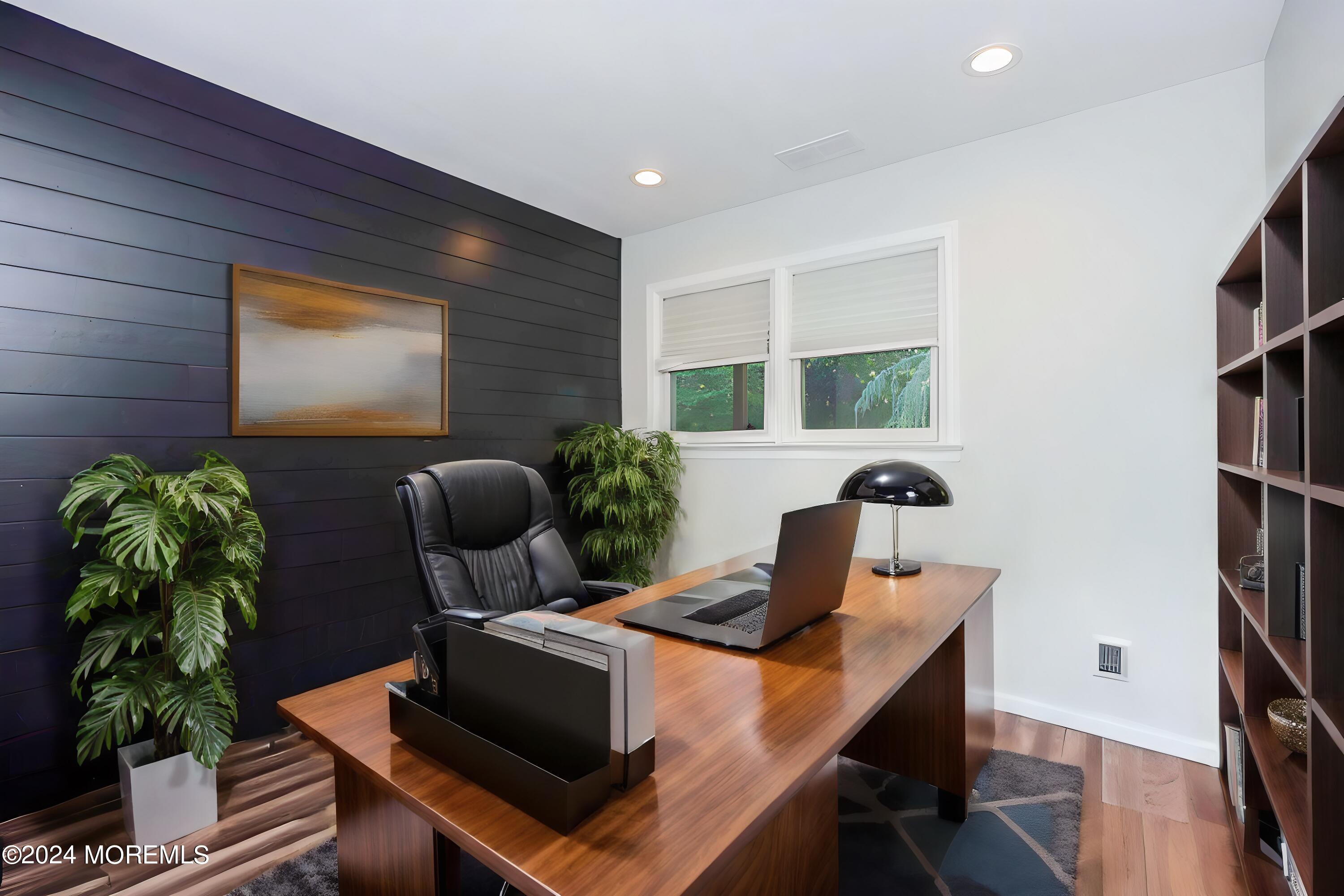 32 Crest Road Middletown, NJ 07748 - Photo 9 of 52 a workspace with furniture and wooden floor