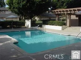 a view of a tree with a yard