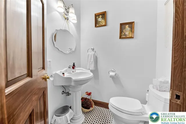 a living room with furniture rug and window