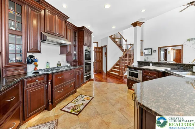 a kitchen with a stove and a sink