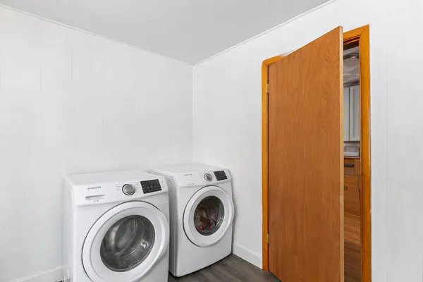 a utility room with dryer and washer