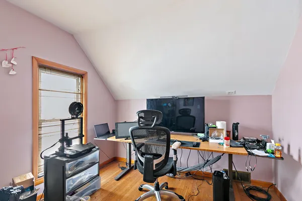a view of a workspace with furniture