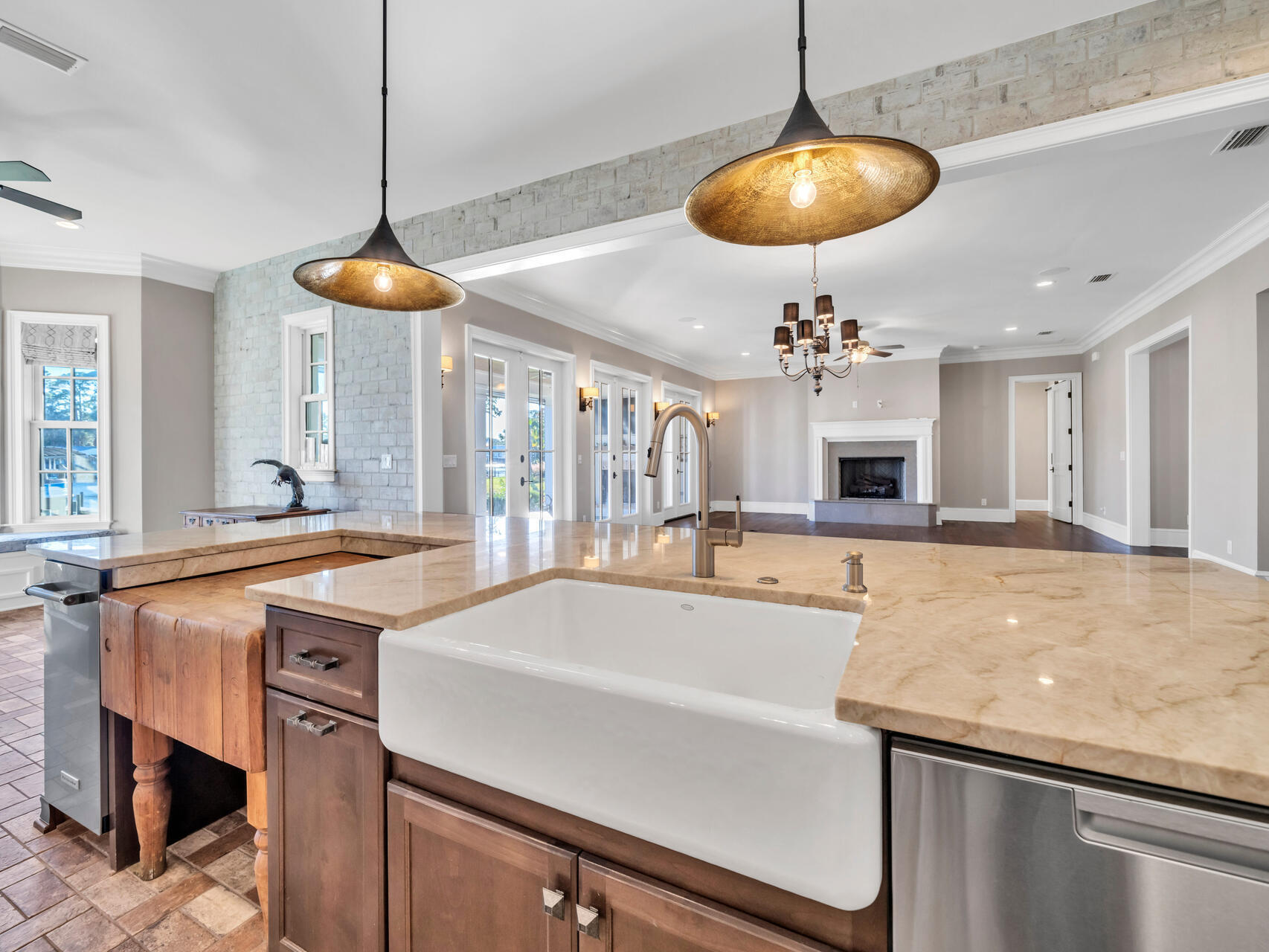 182 Buck Road Santa Rosa Beach, FL 32459 - Photo 30 of 99 a large kitchen with stainless steel appliances granite countertop a sink and a chandelier