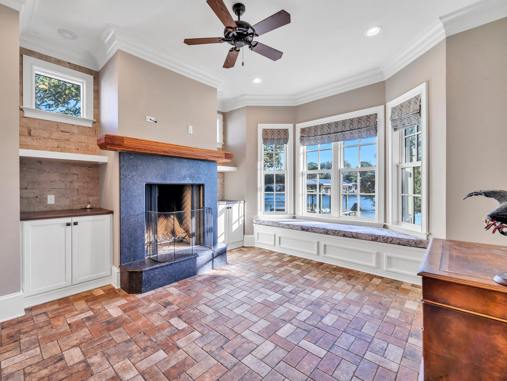 182 Buck Road Santa Rosa Beach, FL 32459 - Photo 33 of 99 a view of an empty room with window and fire place