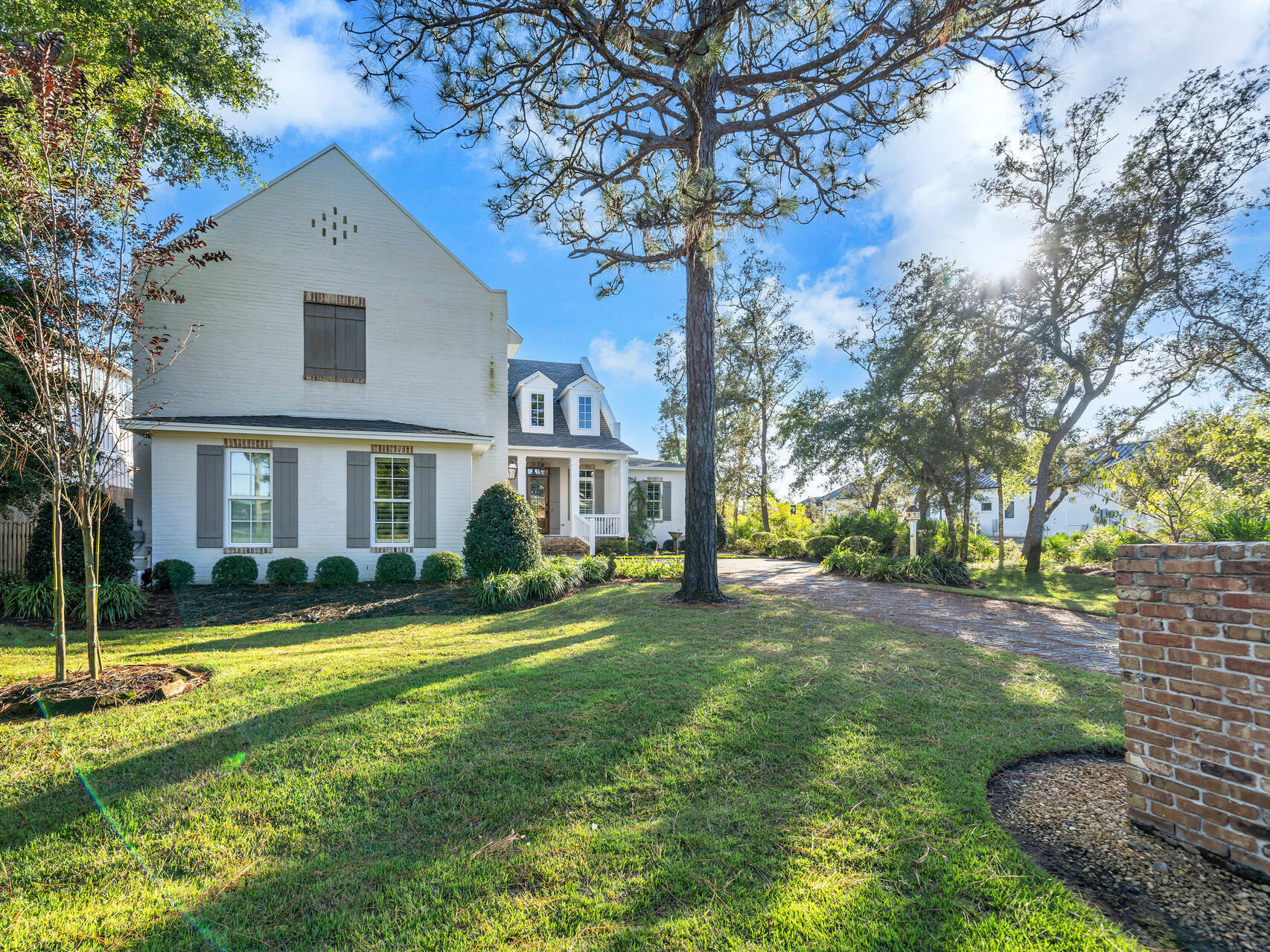 182 Buck Road Santa Rosa Beach, FL 32459 - Photo 5 of 99 a front view of a house with a yard