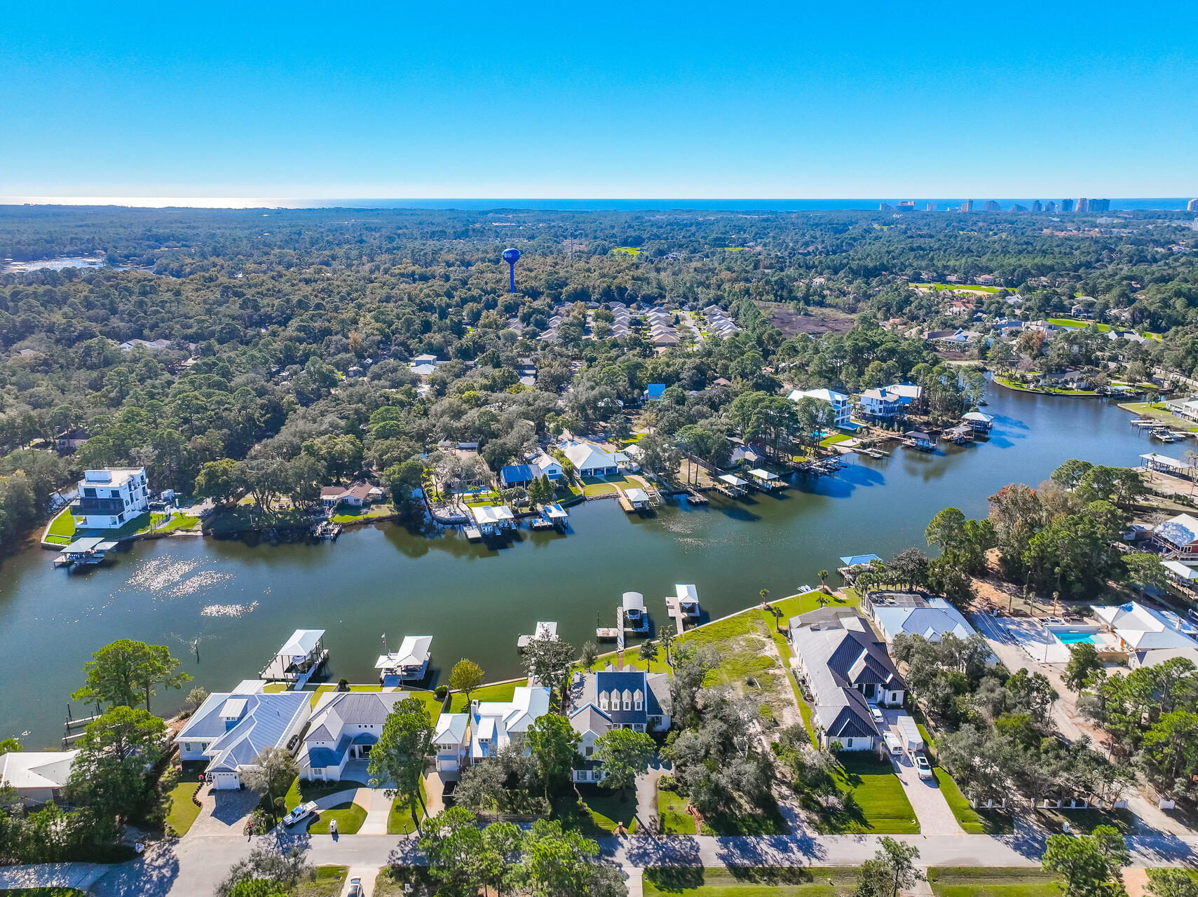182 Buck Road Santa Rosa Beach, FL 32459 - Photo 80 of 99 an aerial view of a city with lots of residential buildings lake and ocean view