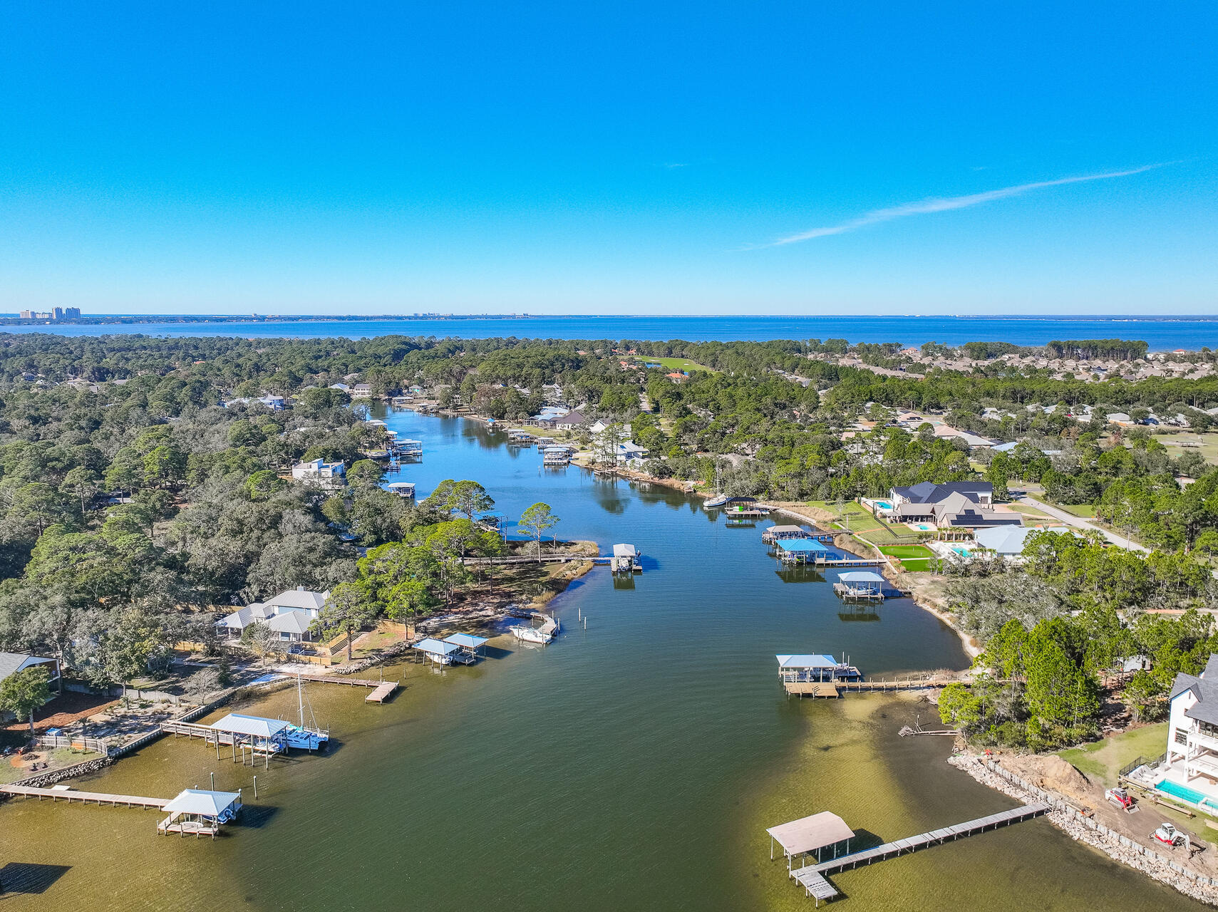 182 Buck Road Santa Rosa Beach, FL 32459 - Photo 81 of 99 an aerial view of residential houses with outdoor space and lake view