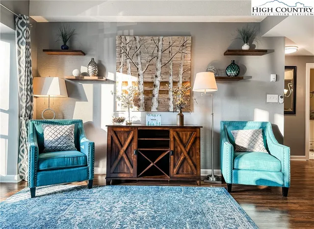 a living room with a couch and a table