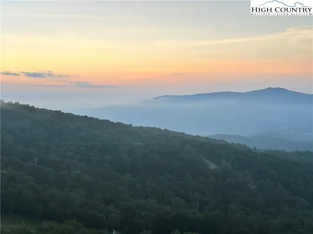 a view of a living room and window