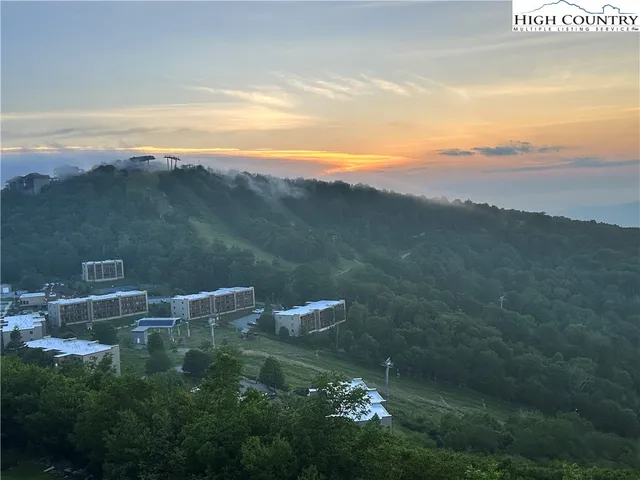 a view of a lake with a mountain