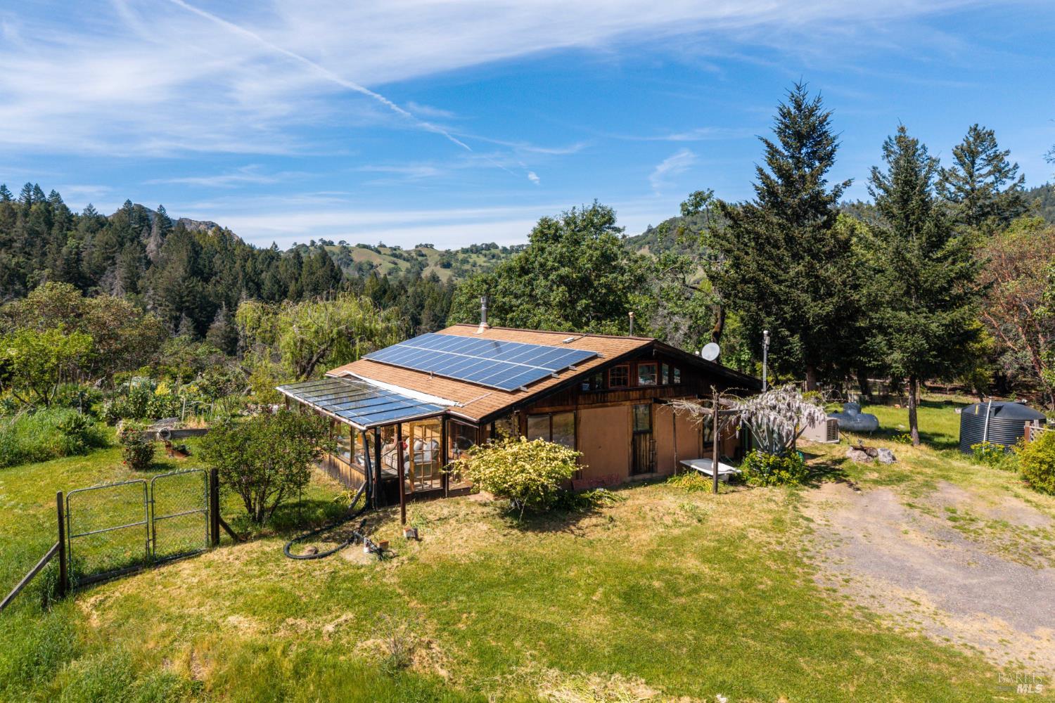 3751 Low Gap Road Ukiah, CA 95482 - Photo 1 of 22 a view of a house with pool and sitting area
