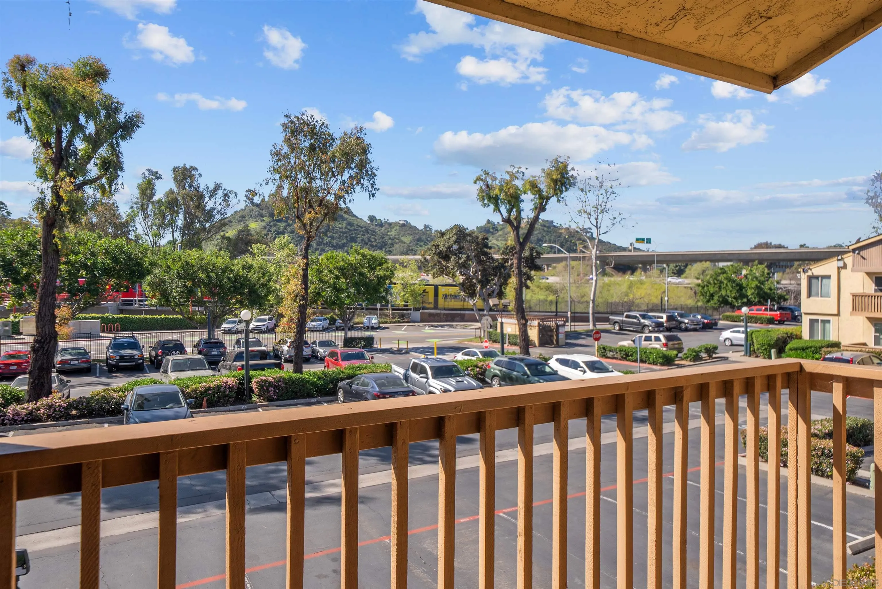 5922 Rancho Mission Road, Unit 74 San Diego, CA 92108 - Photo 16 of 43 a view of city from a balcony
