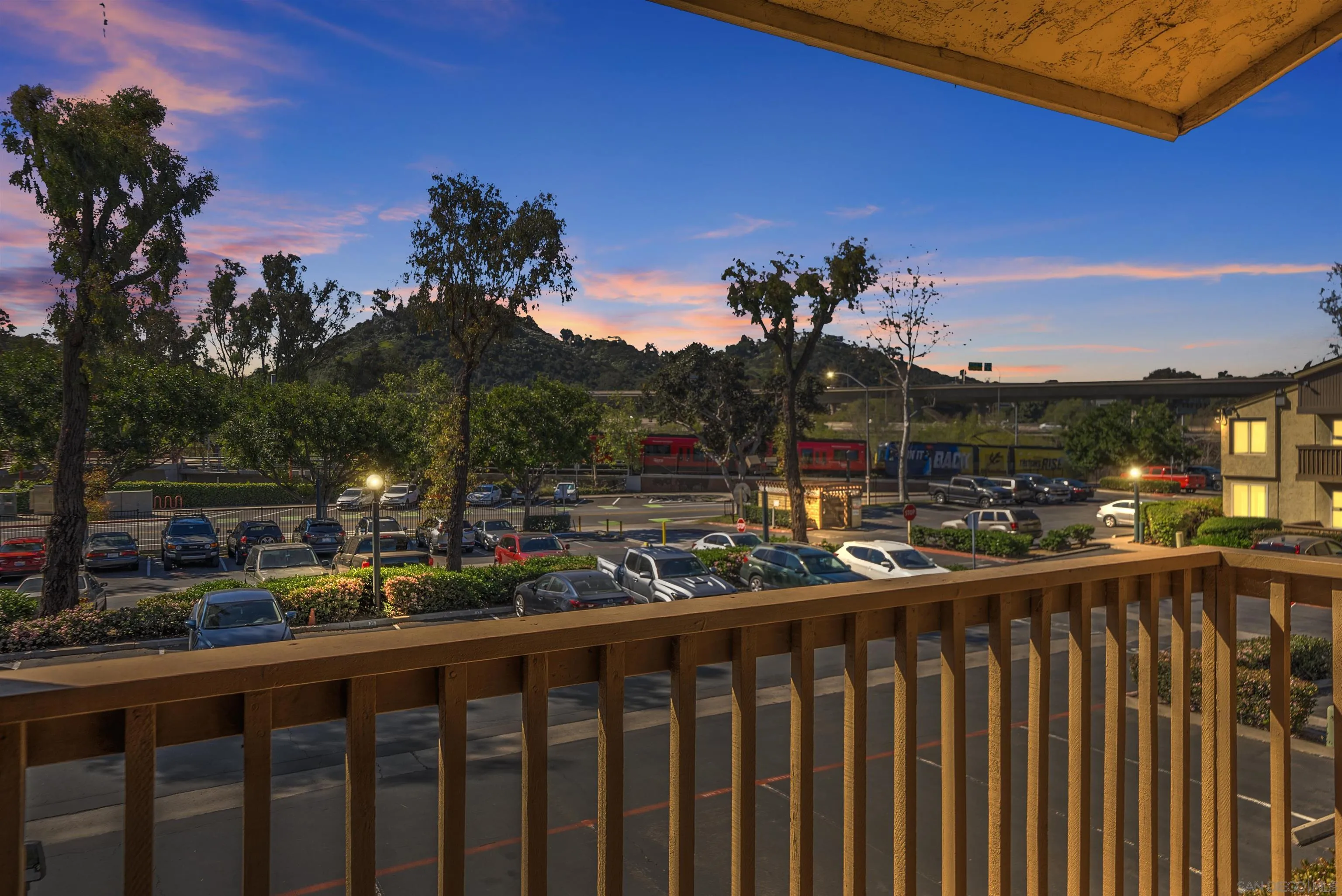 5922 Rancho Mission Road, Unit 74 San Diego, CA 92108 - Photo 17 of 43 a view of a street with a view of city from a balcony