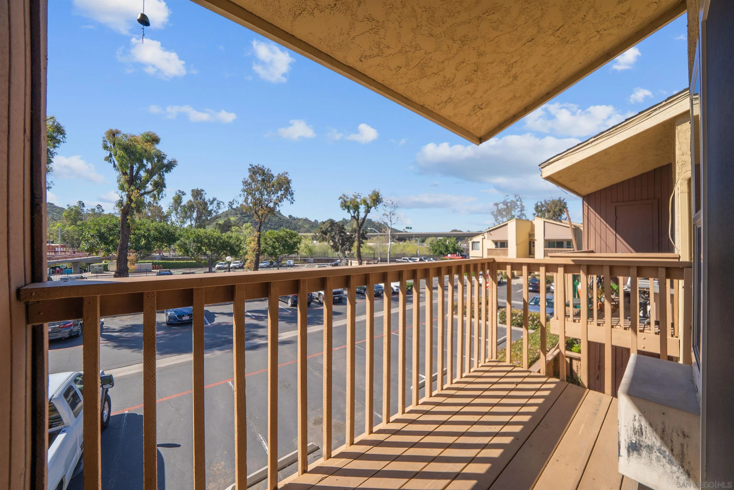 5922 Rancho Mission Road, Unit 74 San Diego, CA 92108 - Photo 18 of 43 a view of city from a balcony