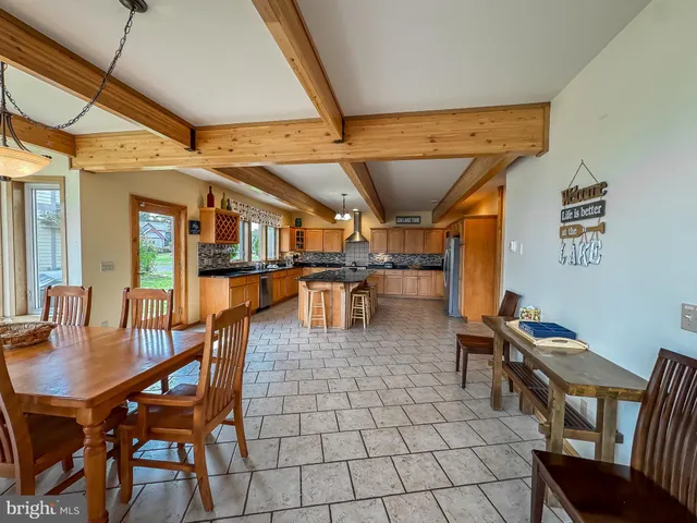 a dining room with furniture and a table