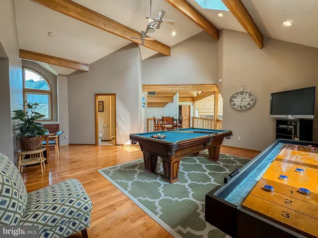 a living room with furniture and a table