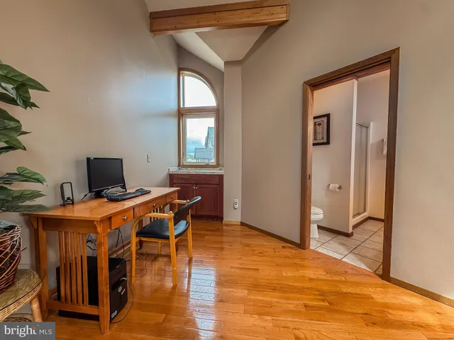 a bed room with a bed and a window