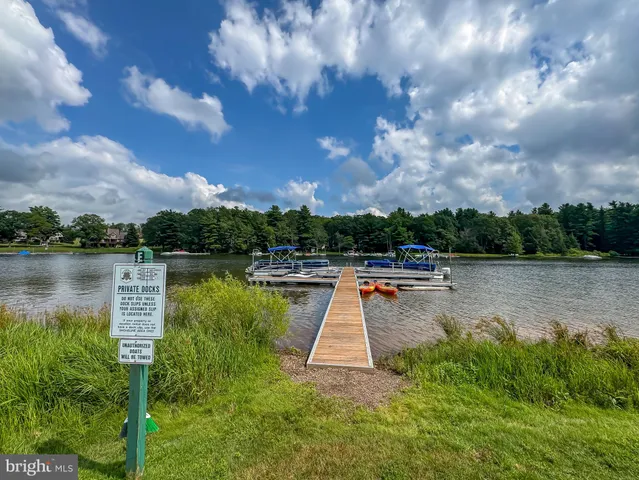 a view of a table and chairs in the garden