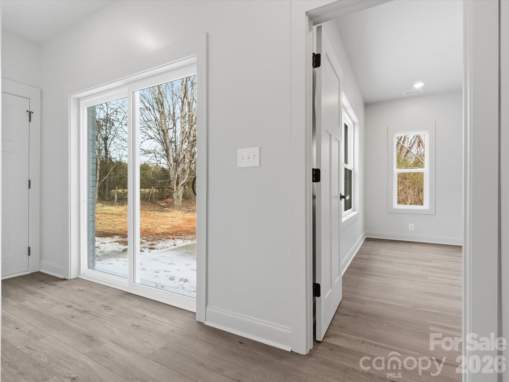 1491 Cedar Grove Road Clover, SC 29710 - Photo 20 of 48 an empty room with wooden floor and windows