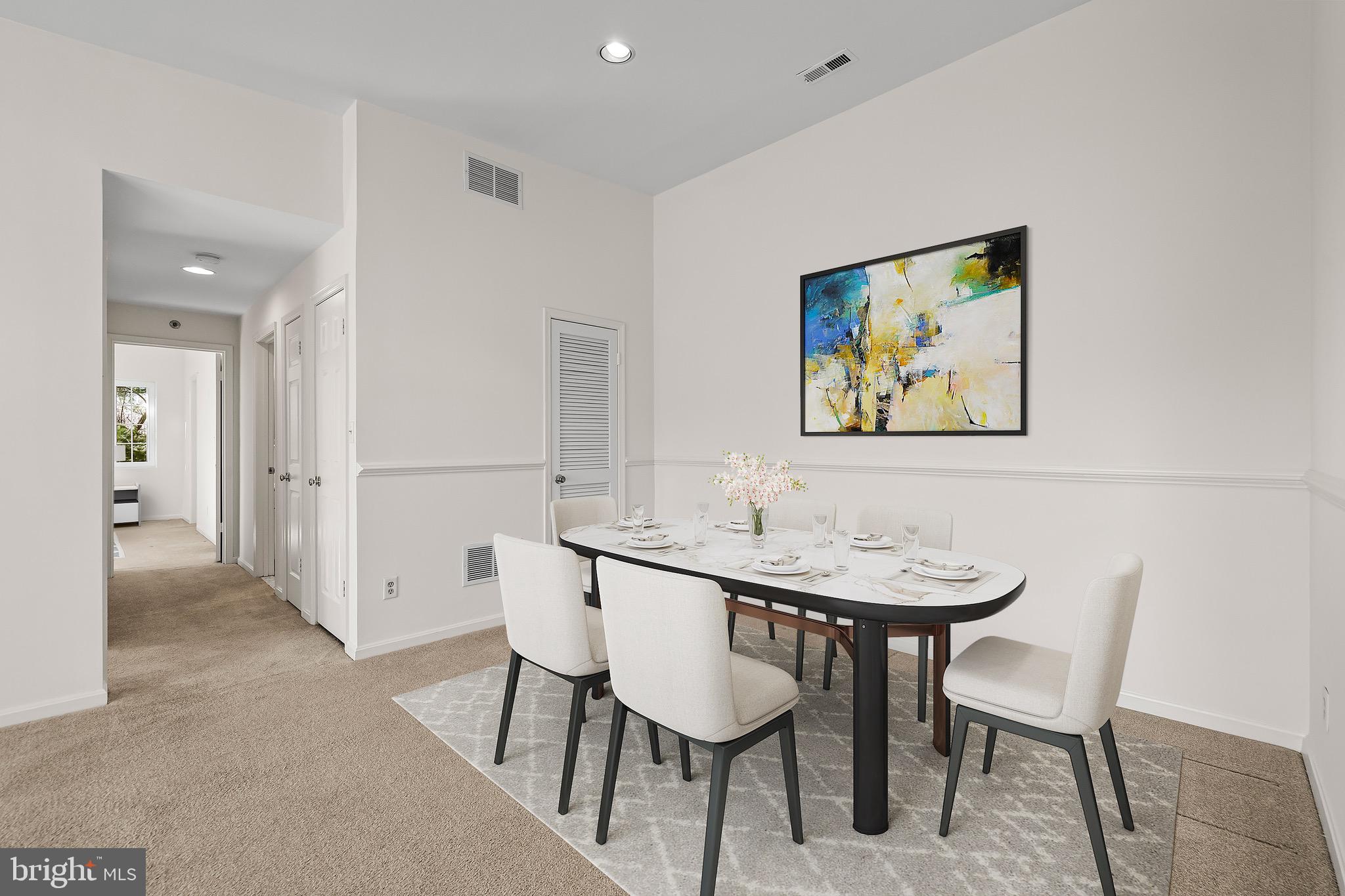 416 Rockfleet Road, Unit 301 Lutherville-Timonium, MD 21093 - Photo 8 of 29 a view of a dining room with furniture