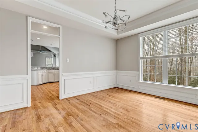 a view of kitchen with livingroom and fireplace