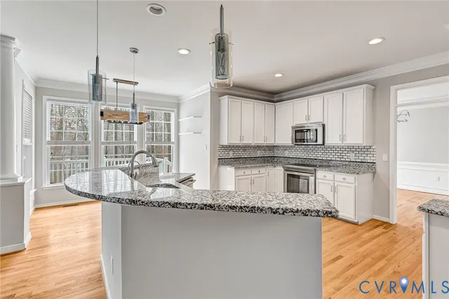 a white bath tub sitting next to a window