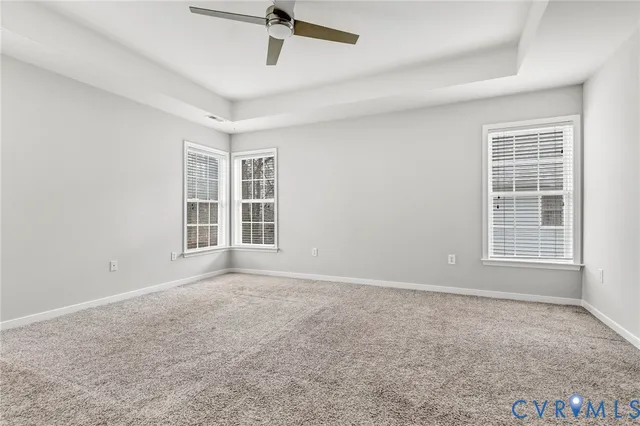 a large space with trees in the background