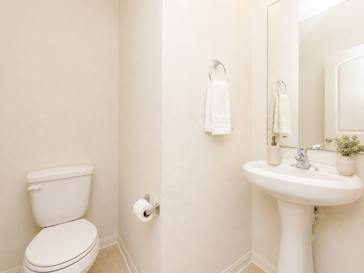 1322 Emerald Stone Drive Rosharon, TX 77583 - Photo 15 of 23 a bathroom with a toilet sink and mirror