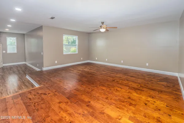 an empty room with windows