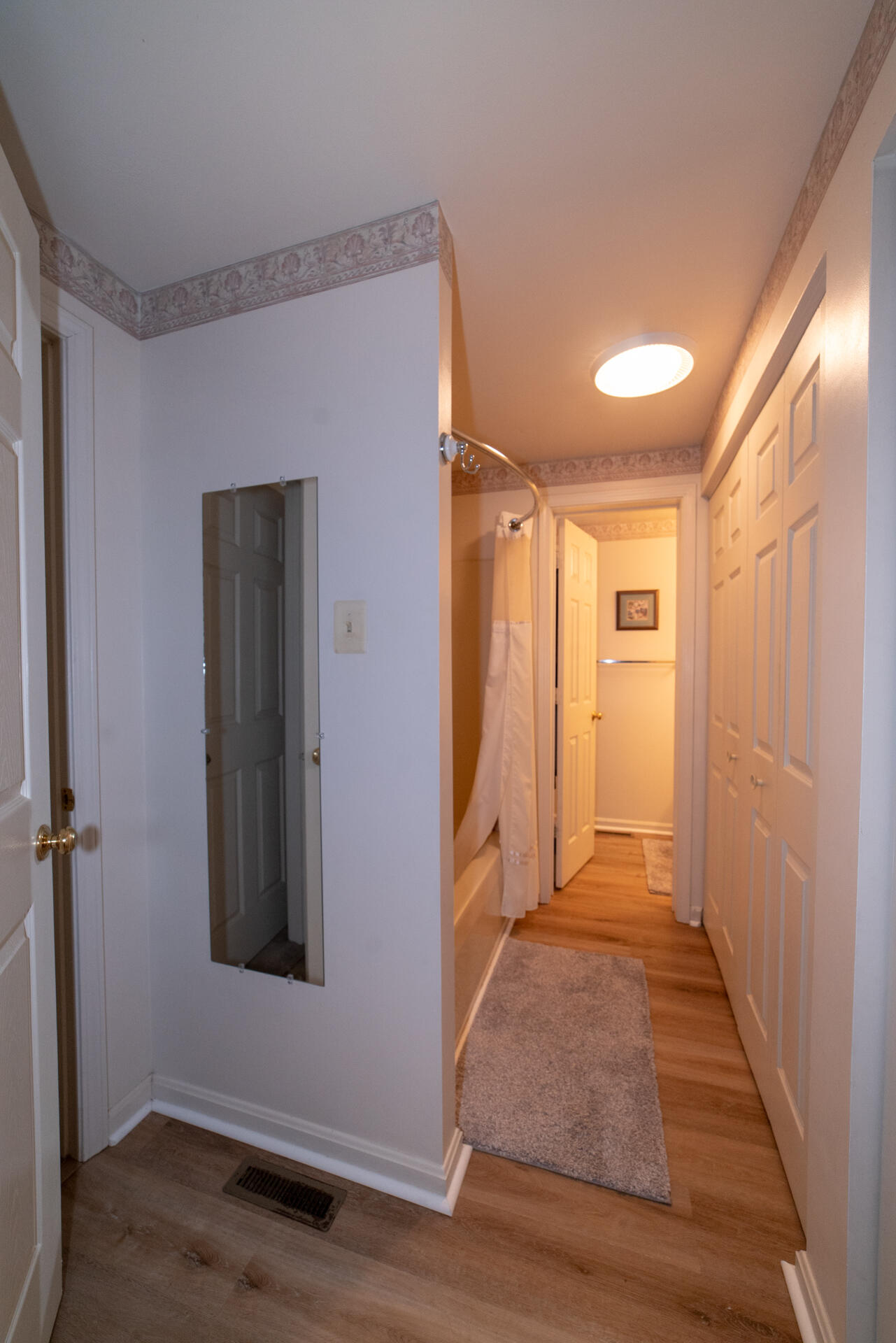 8796 Roanoke Road Elliston, VA 24087 - Photo 13 of 40 a view of a hallway with wooden floor and closet area