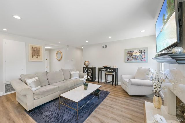 a living room with furniture and a couch