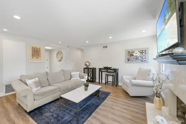 a living room with furniture and a couch