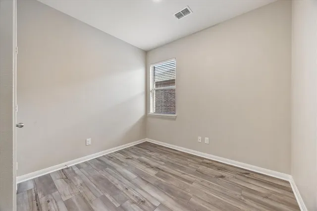 a kitchen with stainless steel appliances granite countertop a refrigerator stove microwave and sink